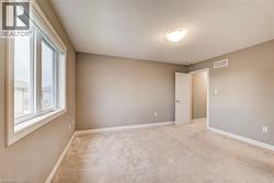 another view of primary bedroom - 