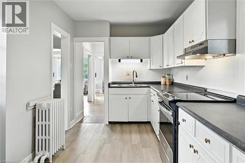 1047 Main Street E, Hamilton, ON - Indoor Photo Showing Kitchen With Double Sink