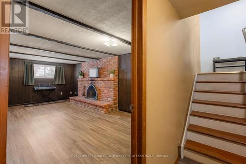 401 Mohawk Road W, Hamilton, ON - Indoor Photo Showing Other Room With Fireplace