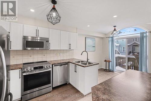 322 Selene Way, Ottawa, ON - Indoor Photo Showing Kitchen With Stainless Steel Kitchen With Double Sink