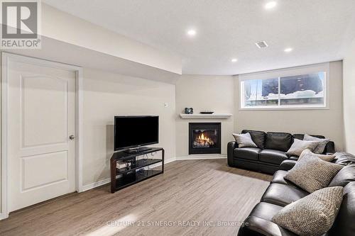 322 Selene Way, Ottawa, ON - Indoor Photo Showing Living Room With Fireplace