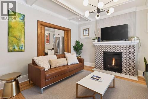 108 Rosslyn Avenue S, Hamilton, ON - Indoor Photo Showing Living Room With Fireplace