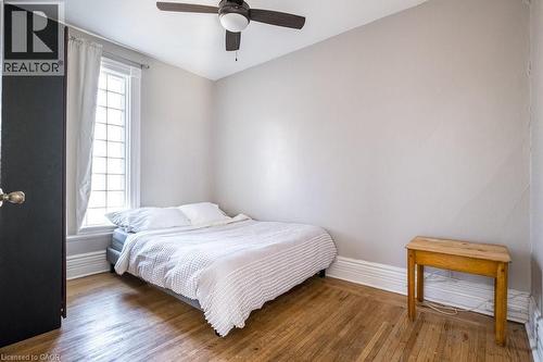 No carpeting. Original Hard wood floors. - 270 Queen Street S Unit# 2, Hamilton, ON - Indoor Photo Showing Bedroom