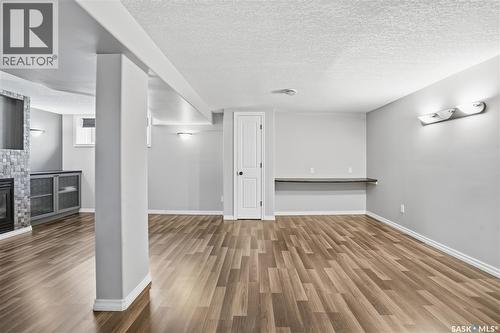 39 Peart Crescent, Regina, SK - Indoor Photo Showing Other Room With Fireplace