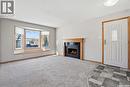 39 Peart Crescent, Regina, SK  - Indoor Photo Showing Living Room With Fireplace 