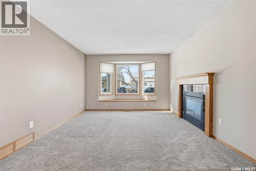 39 Peart Crescent, Regina, SK - Indoor With Fireplace