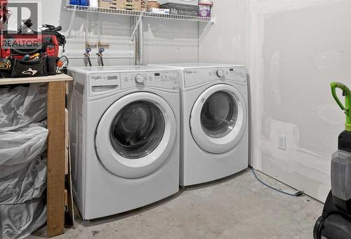 61 Auburn Meadows View Se, Calgary, AB - Indoor Photo Showing Laundry Room