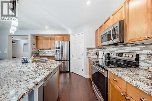 574 Chaparral Drive Se, Calgary, AB - Indoor Photo Showing Kitchen With Stainless Steel Kitchen With Double Sink With Upgraded Kitchen