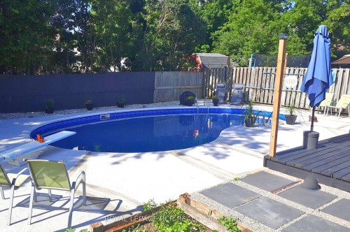 18 Spruyt Avenue, East Luther Grand Valley, ON - Outdoor With In Ground Pool