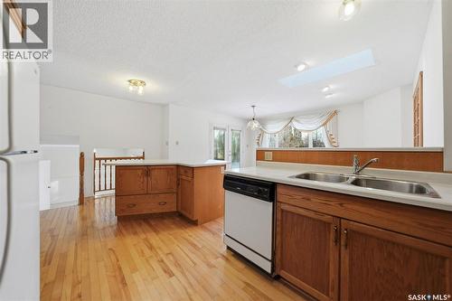 110 Cowley Road, Saskatoon, SK - Indoor Photo Showing Kitchen With Double Sink