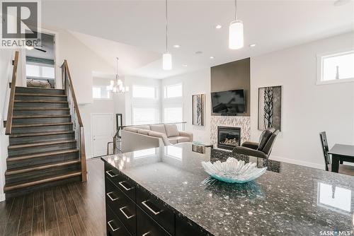 458 Teal Lane, Saskatoon, SK - Indoor Photo Showing Other Room With Fireplace