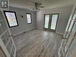 Dining Room With Walk Out To Screened In Porch - 