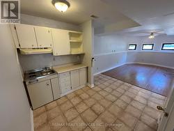 Basement Kitchenette Combined With Living Room - 