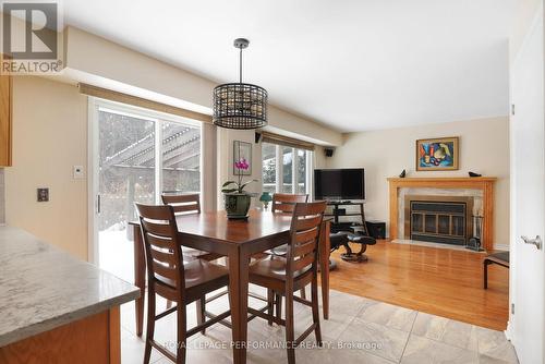 10 Ellisson Way, Ottawa, ON - Indoor Photo Showing Dining Room With Fireplace