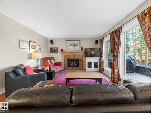 220 Ronning Cl Nw, Edmonton, AB - Indoor Photo Showing Living Room With Fireplace