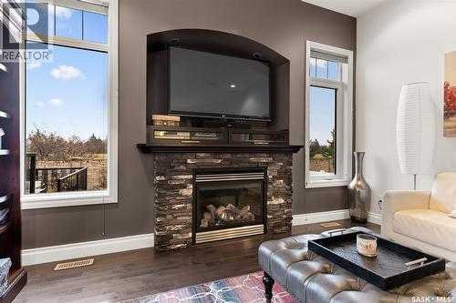 4613 Hames Crescent, Regina, SK - Indoor Photo Showing Living Room With Fireplace