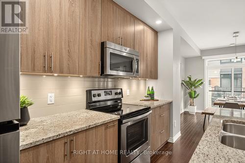 521 Chaperal Private N, Ottawa, ON - Indoor Photo Showing Kitchen With Double Sink With Upgraded Kitchen