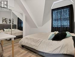 SPACIOUS BEDROOM W/BUILT IN CLOSET & LARGE WINDOWS - 