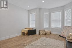 LIVING ROOM W/AMPLE WINDOWS & NATURAL LIGHT - 