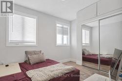 SPACIOUS BEDROOM W/ BUILT IN CLOSET & LRG WINDOWS - 