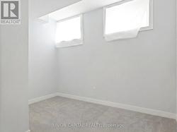 LARGE WINDOWS FOR NATURAL LIGHT IN THE BASEMENT - 