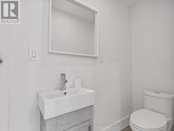 POWDER ROOM IN COMMERCIAL UNIT - 