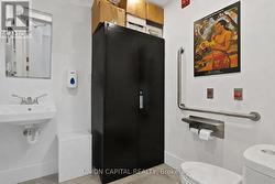 ACCESSIBLE BATHROOM AND EXTERIOR WHEELCHAIR RAMP - 