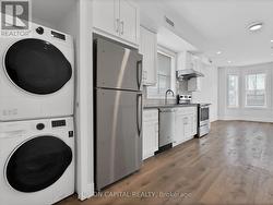 STACKED VENTLESS WASHER/DRYER - 