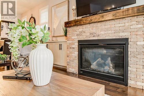 58 Eden Oak Trail, Kitchener, ON - Indoor Photo Showing Living Room With Fireplace