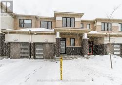 703 DERREEN AVENUE  Ottawa, ON K2S 2Z2