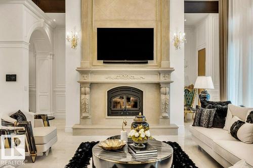 211 Windermere Dr Nw, Edmonton, AB - Indoor Photo Showing Living Room With Fireplace