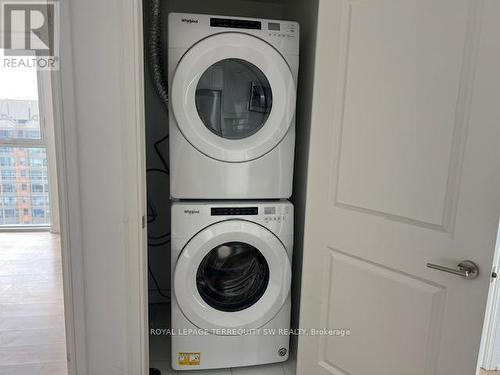 1006 - 8 Nahani Way, Mississauga, ON - Indoor Photo Showing Laundry Room