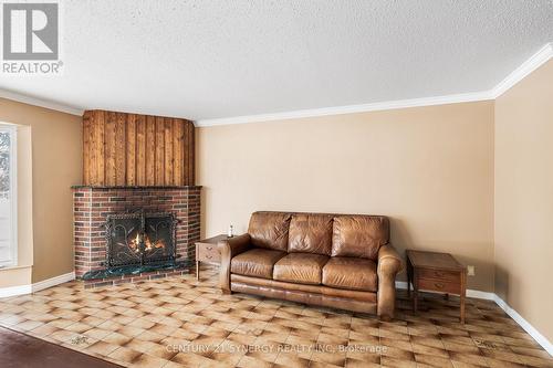 2414 Joliffe Street, Ottawa, ON - Indoor Photo Showing Living Room With Fireplace