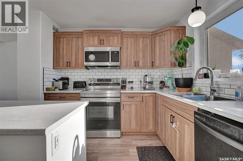 403 Eldorado Street, Warman, SK - Indoor Photo Showing Kitchen With Double Sink