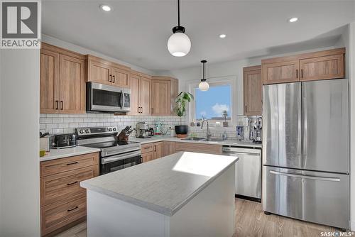 403 Eldorado Street, Warman, SK - Indoor Photo Showing Kitchen With Stainless Steel Kitchen With Double Sink