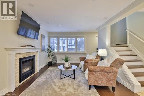 282 Pine Cove Road, Burlington, ON - Indoor Photo Showing Living Room With Fireplace