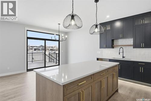 166 Cockroft Manor, Saskatoon, SK - Indoor Photo Showing Kitchen With Upgraded Kitchen