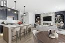 166 Cockroft Manor, Saskatoon, SK  - Indoor Photo Showing Kitchen With Fireplace With Upgraded Kitchen 