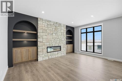 166 Cockroft Manor, Saskatoon, SK - Indoor With Fireplace