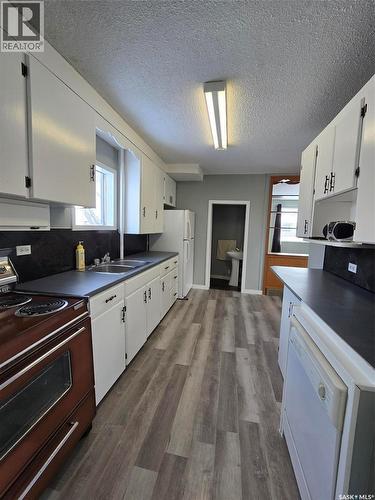806 Pheasant Street, Grenfell, SK - Indoor Photo Showing Kitchen With Double Sink