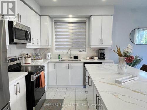 325 Trudeau Drive E, Milton, ON - Indoor Photo Showing Kitchen With Double Sink