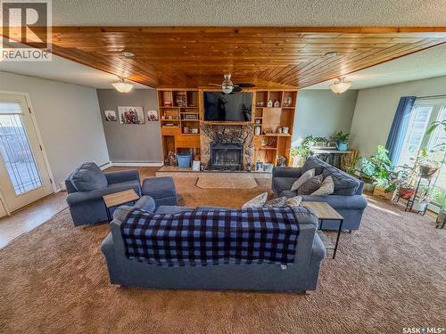 405 5Th Street E, Shaunavon, SK - Indoor Photo Showing Living Room With Fireplace