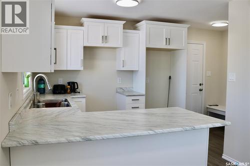 511 1St Avenue, Wapella, SK - Indoor Photo Showing Kitchen With Double Sink