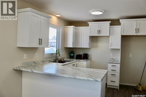 511 1St Avenue, Wapella, SK - Indoor Photo Showing Kitchen With Double Sink
