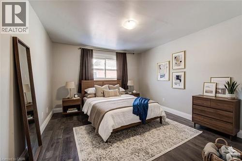 Bedroom featuring dark wood-type flooring and baseboards - 417 Garden Street, Cambridge, ON - Indoor Photo Showing Bedroom