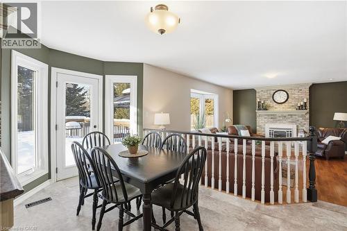 1 Meander Close, Hamilton, ON - Indoor Photo Showing Dining Room With Fireplace