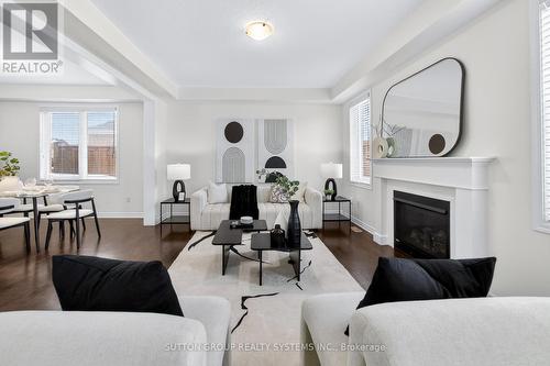 693 Doon South Drive, Kitchener, ON - Indoor Photo Showing Living Room With Fireplace
