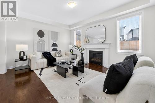 693 Doon South Drive, Kitchener, ON - Indoor Photo Showing Living Room With Fireplace