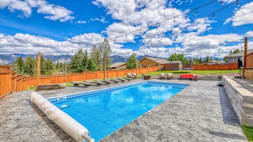 945 Westridge Way, Invermere, BC - Outdoor With In Ground Pool With Backyard