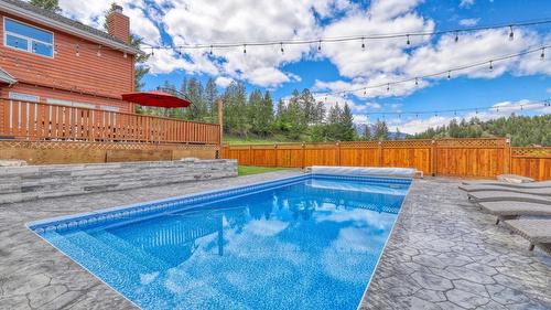 945 Westridge Way, Invermere, BC - Outdoor With In Ground Pool With Backyard
